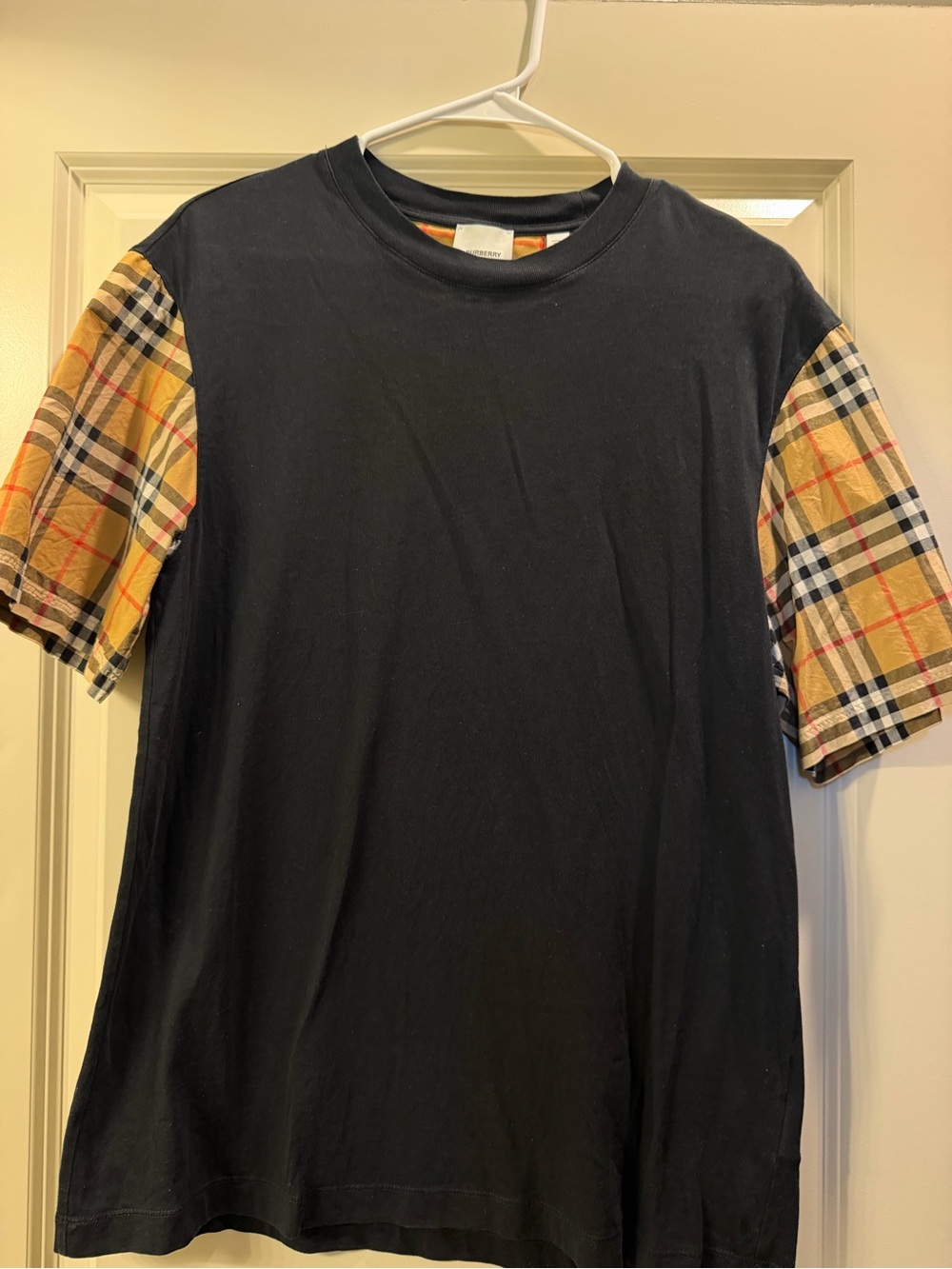 Burberry Black Tee with Signature Beige Plaid Sleeves